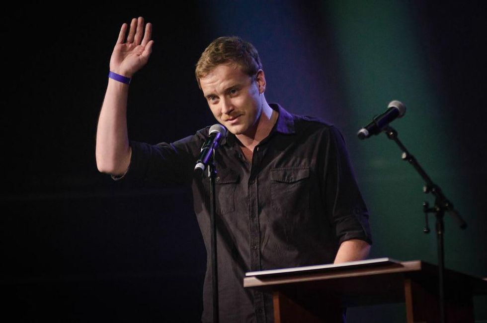 Danny Reisch accepts award at AMP Ungala