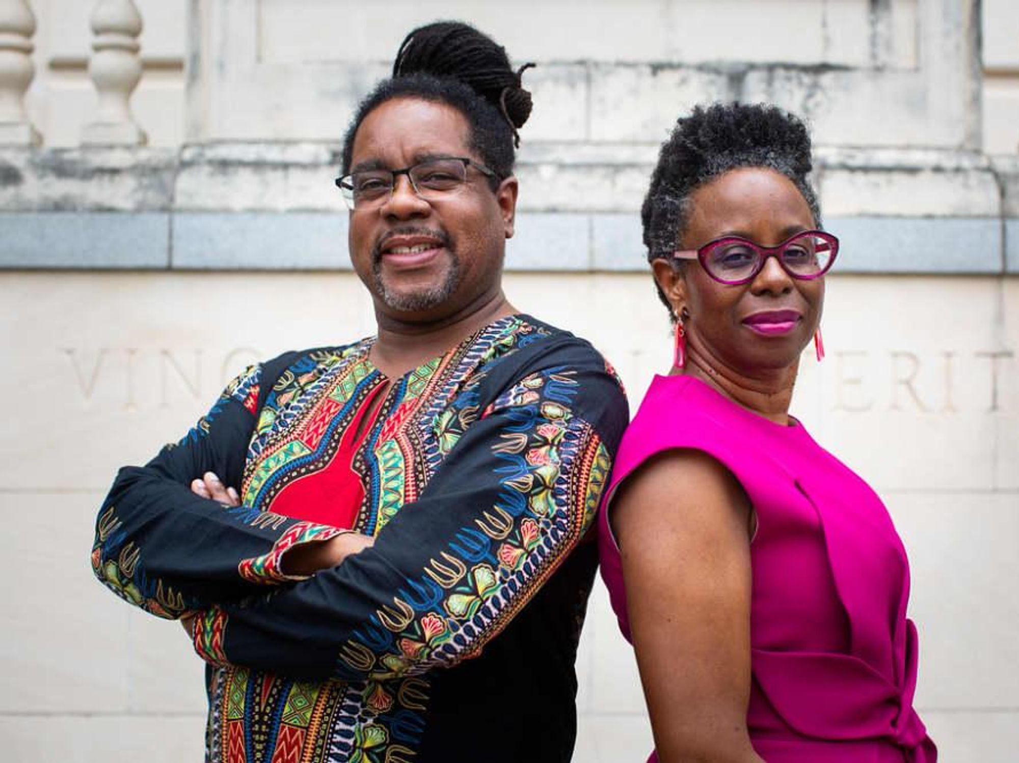 Dr. Richard Reddick and Dr. Lisa B. Thompson pose together, promoting their new podcast.