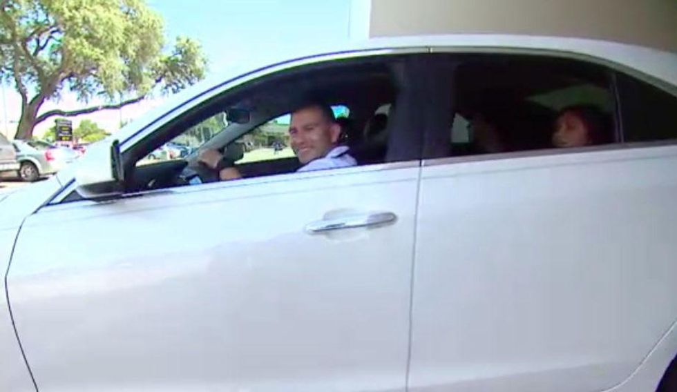 driving off in a cadillac
