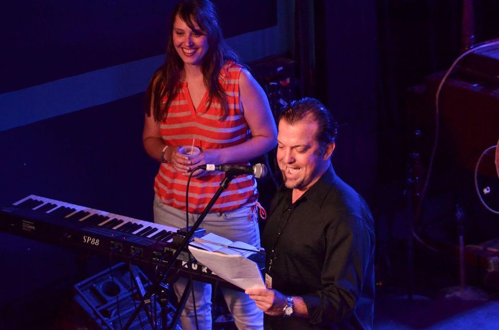 Emcee announces a band at HAAM Battle of the Bands