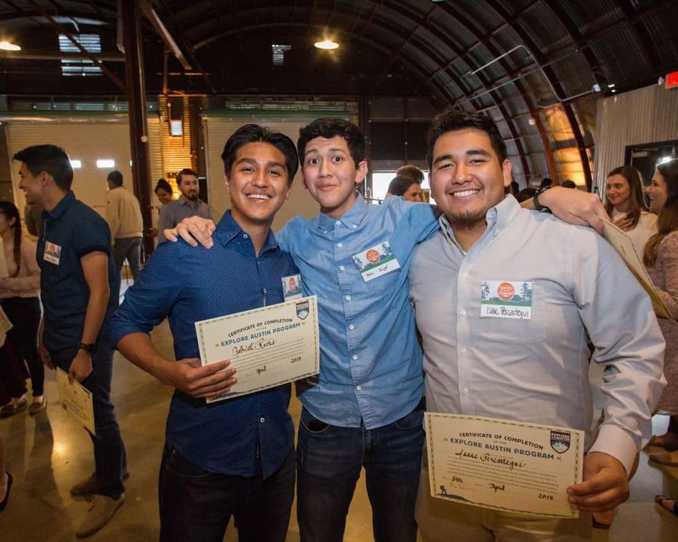 Explore Austin Graduating Explorers Gabriel R., Pedro R., and Issac P. PC Andy Sams.jpg