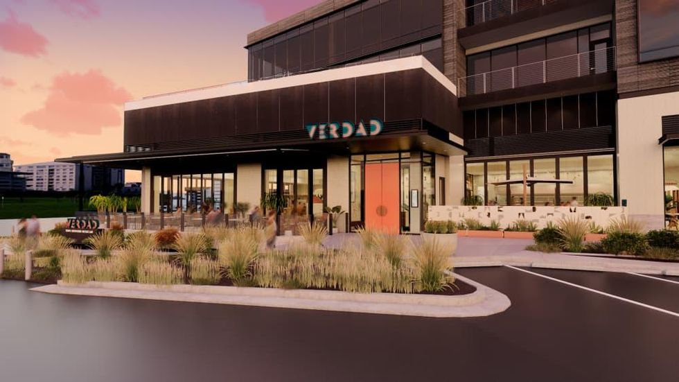 Exterior rendering of Verdad, sleek black and white accents from parking.