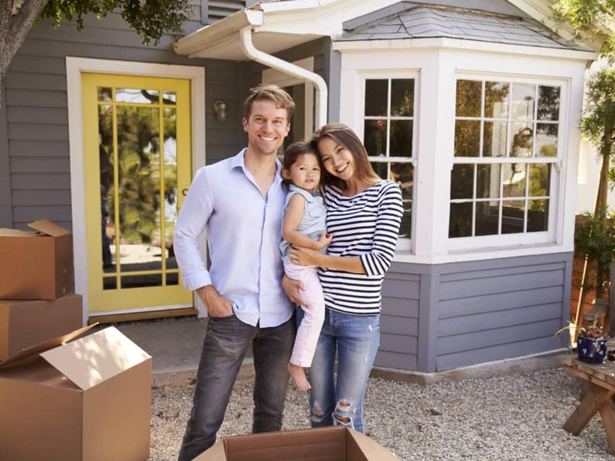 Family in front of a house