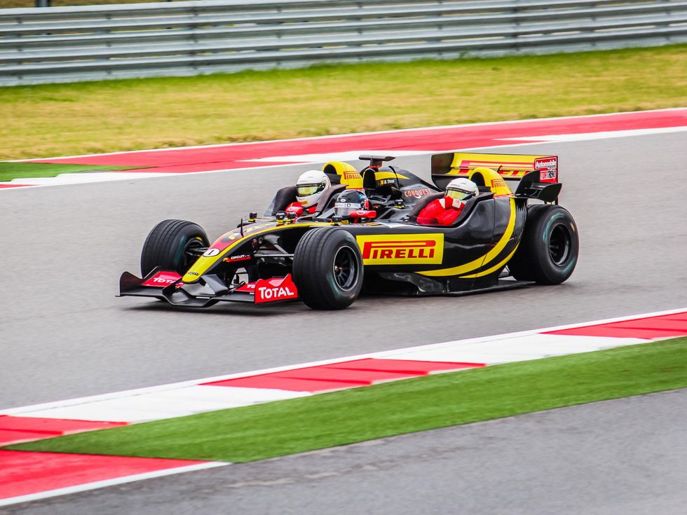 Formula 1 ride along on straightaway for Ride Drive Give promotional benefit