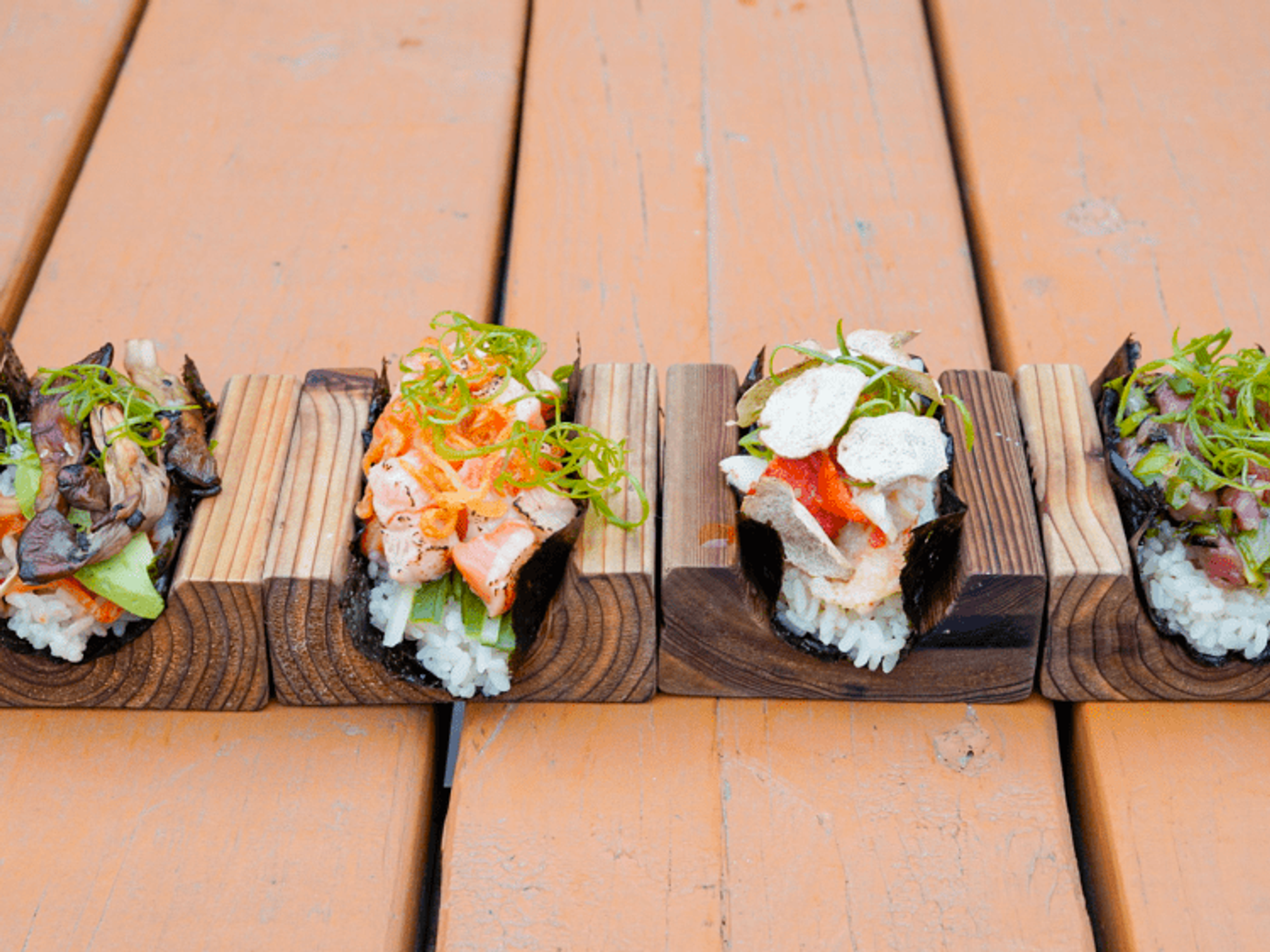 From salmon to king crab, pork belly, and oyster mushrooms, there's a hand roll for every taste.