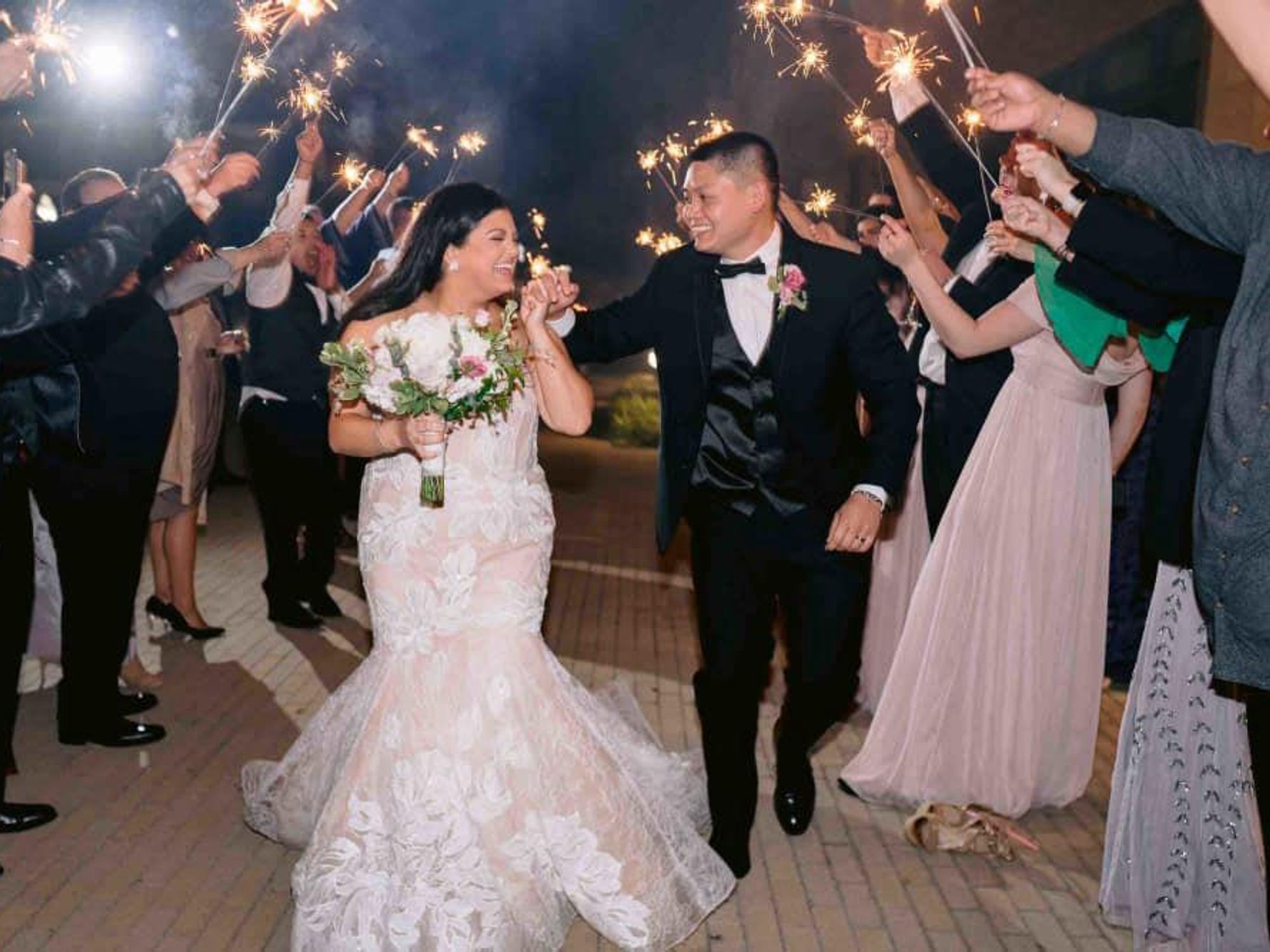 Georgette Raad and Long Hoang's sparkly wedding exit.