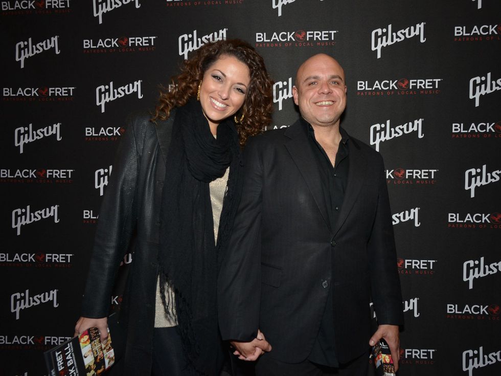 Gibson Black Ball Red Carpet Black Fret Advisory Board member Carlos Sola and guest