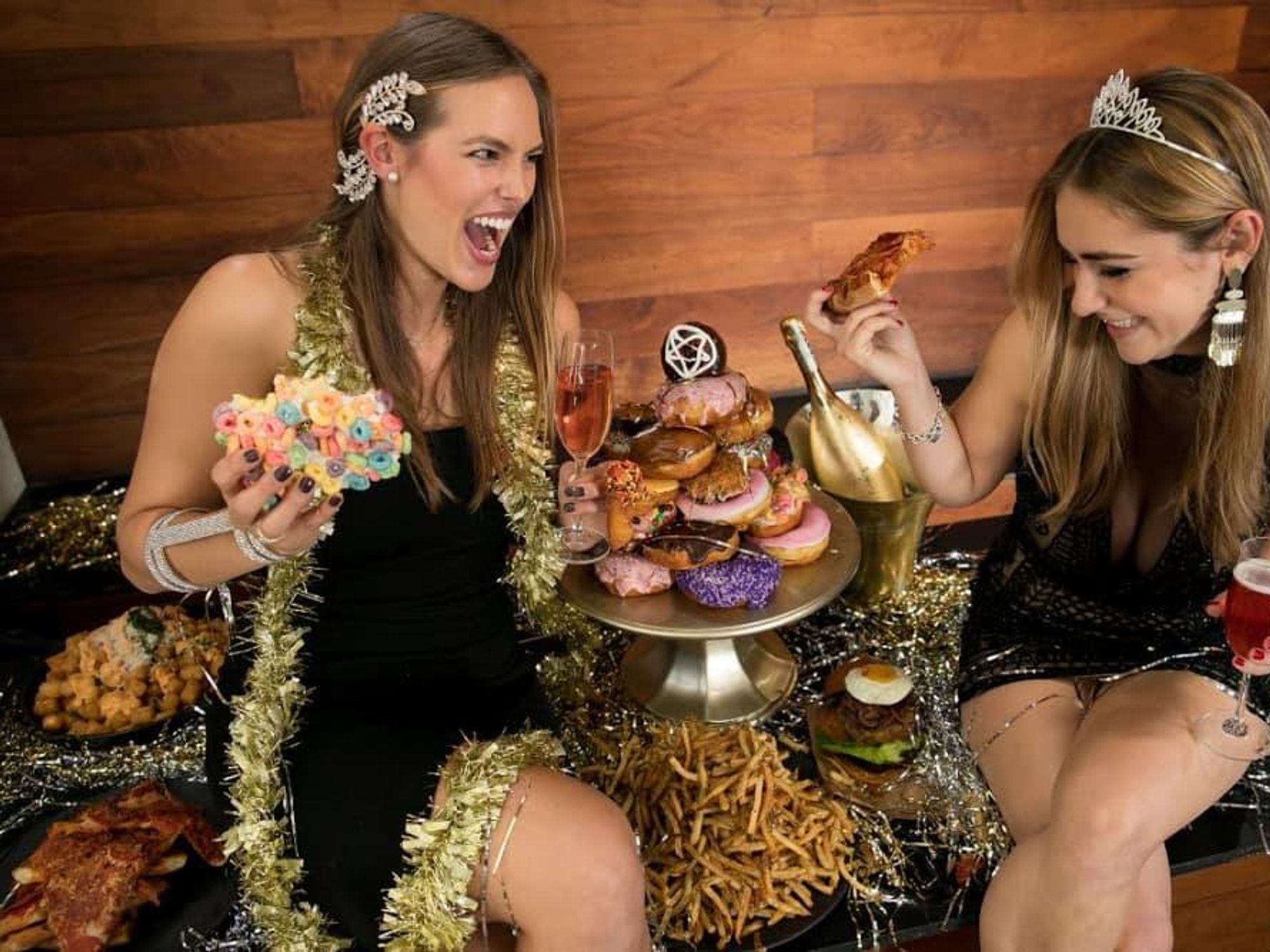 Girls surrounded by food on New Year's Eve