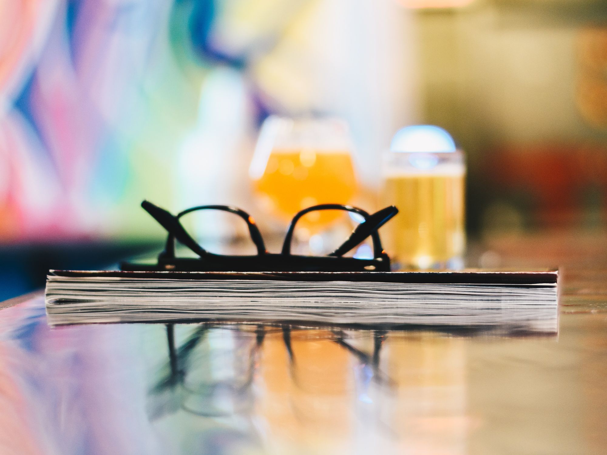 Glasses and book on counter