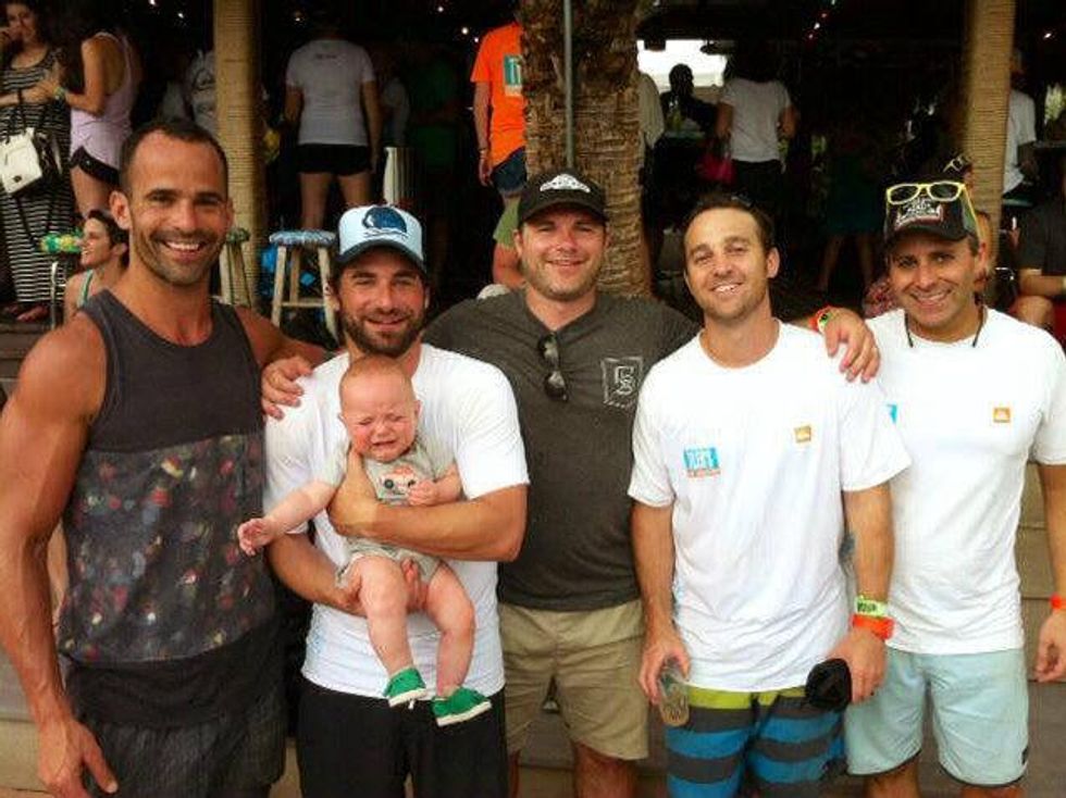 guests at hula hut party for Tyler's Dam that Cancer with baby