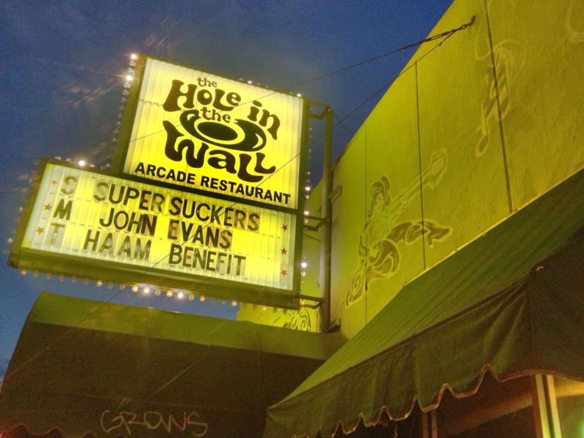 Hole in the Wall Austin bar exterior sign 2012