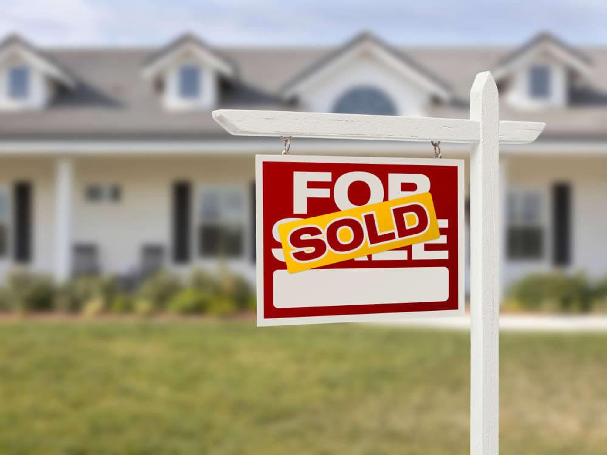 Home for sale sold sign