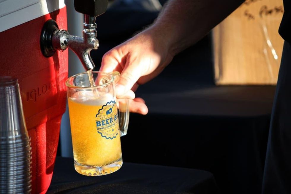 Horseshoe Bay Beers by bay draft pouring hand