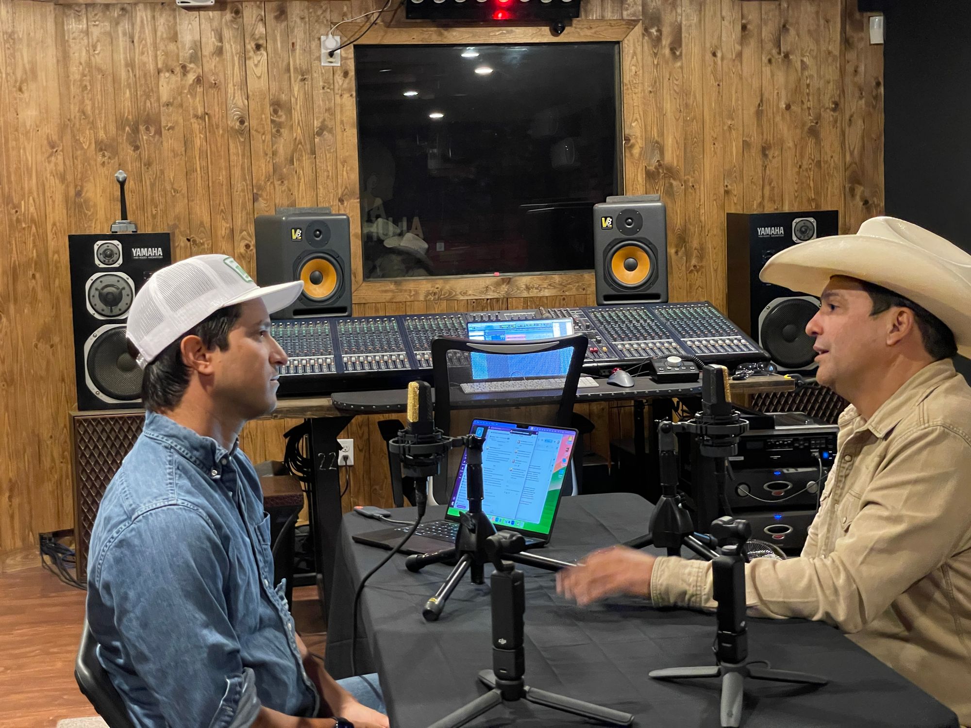 Host J.B. Sauceda interviews a guest for Texas Monthly's new podcast, Viva Tejano.