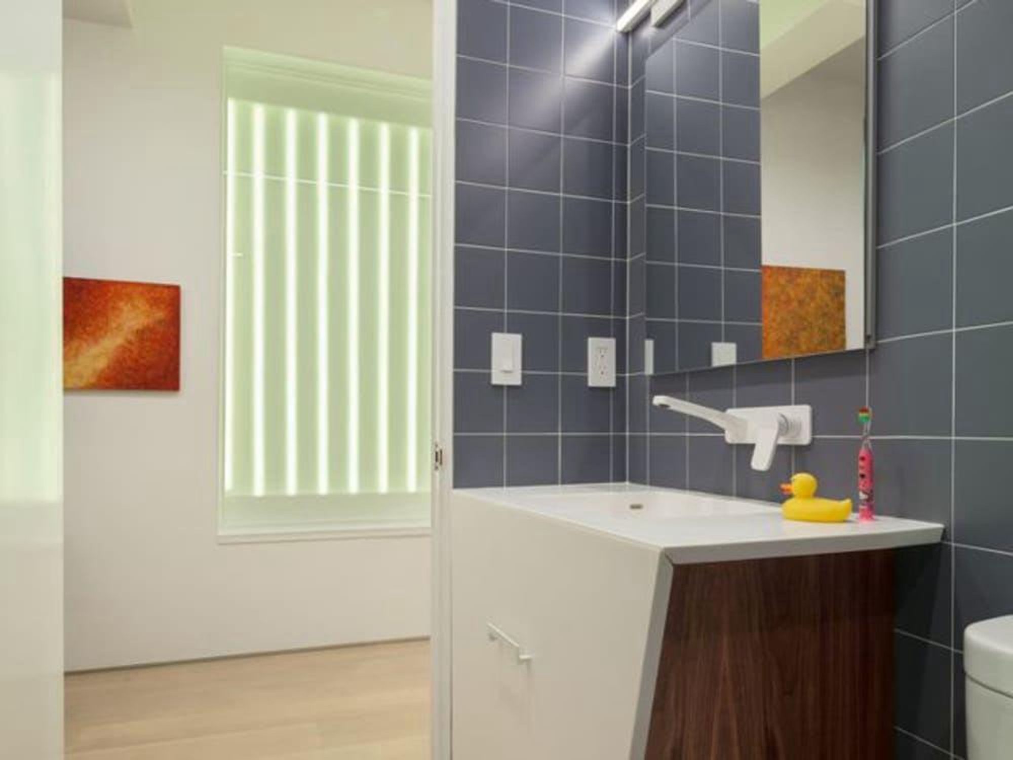 Houzz bathroom with wood vanity