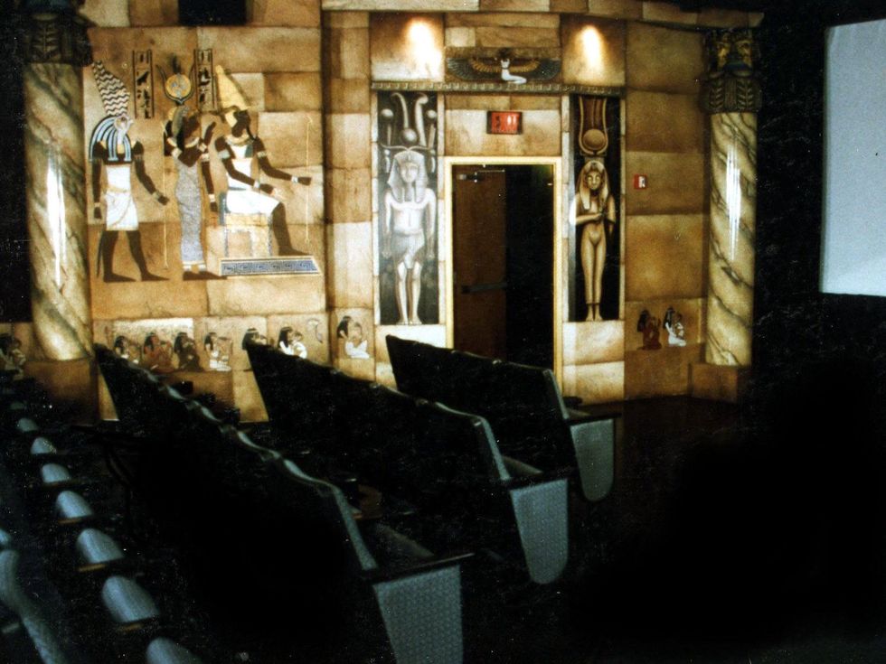 interior of Dobie Theater screening room with Egyptian mural