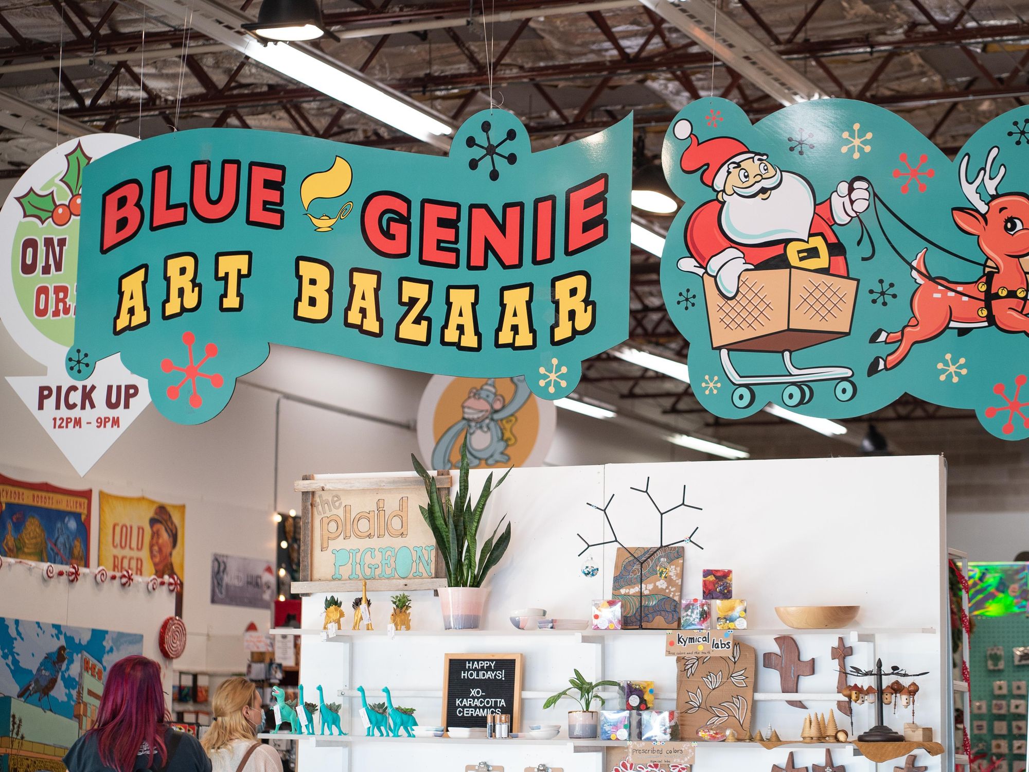 Interior sign of Blue Genie Art Bazaar in Austin