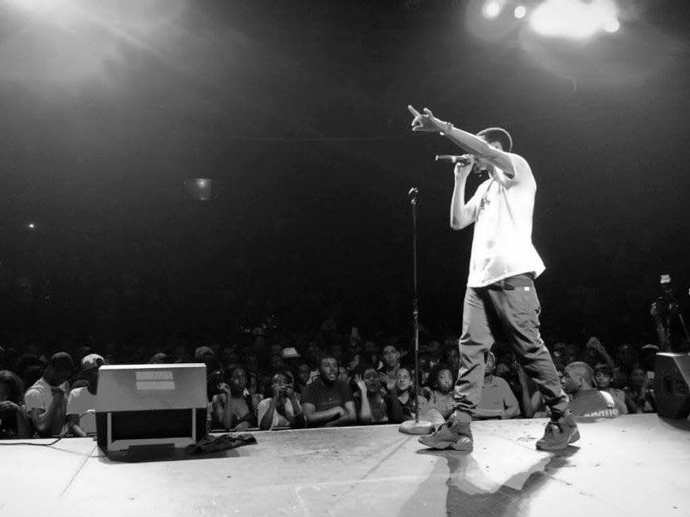 J. Cole onstage