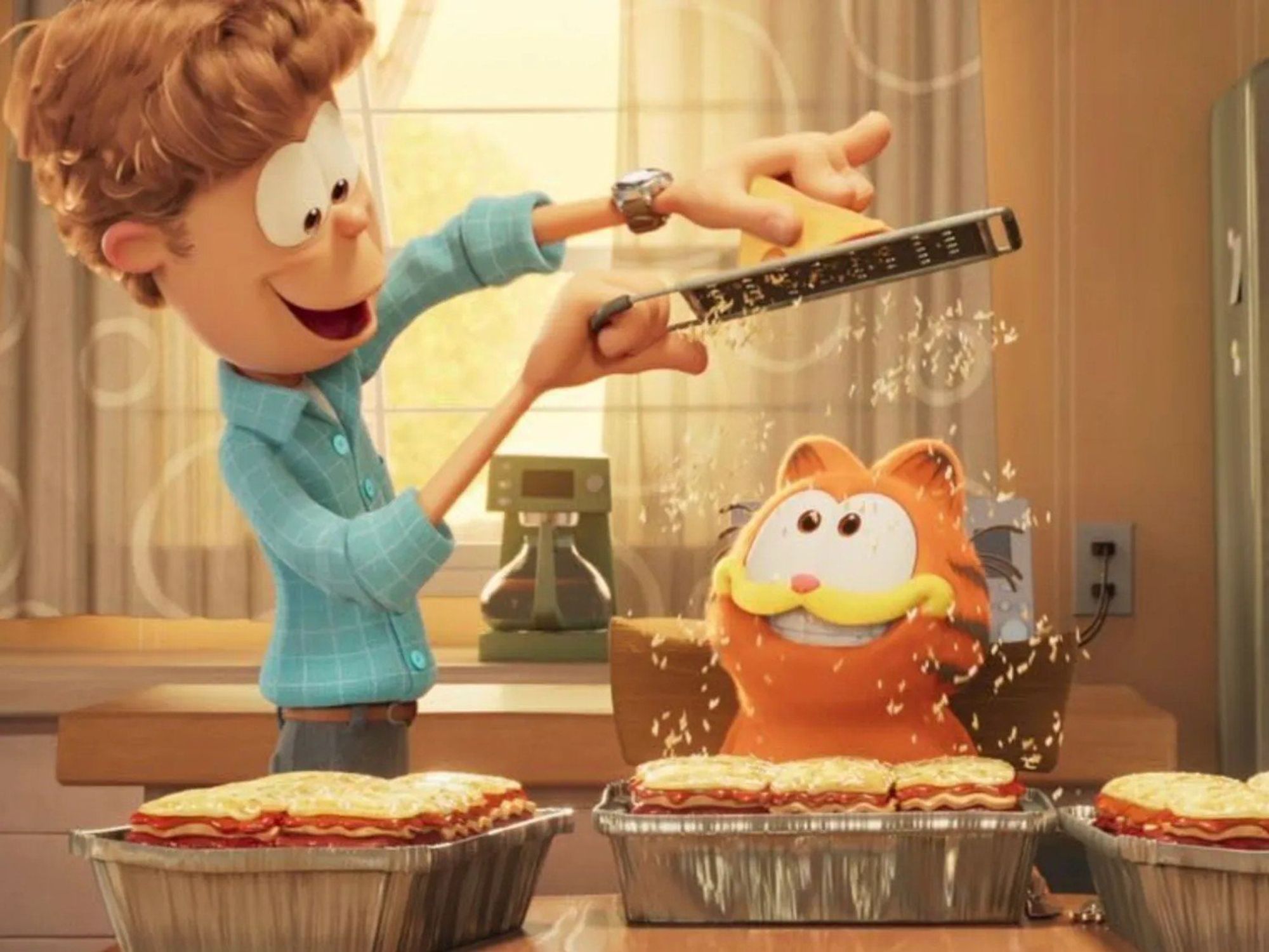 Jon (Nicholas Hoult) and Garfield (Chris Pratt) in The Garfield Movie