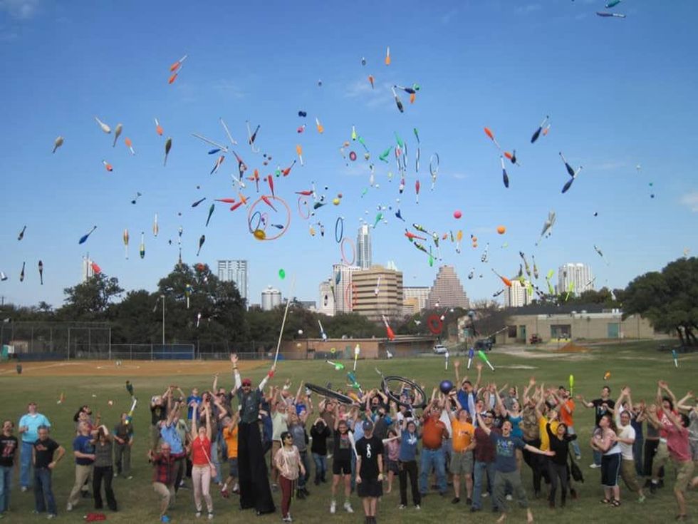 jugglers performing in a field for Austin Jugglefest for Texas Juggling Society