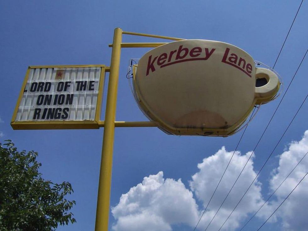 Kerbey Lane Cafe original coffee cup sculpture sign