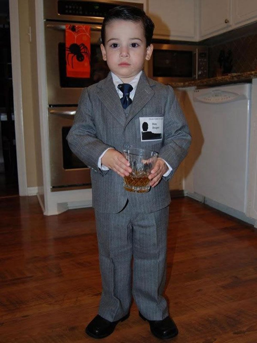 Kid dressed as Don Draper