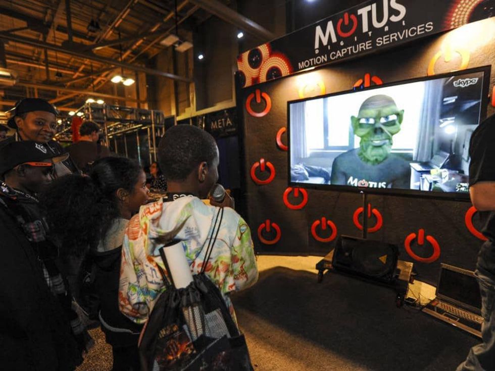 kids playing at the SXSW Gaming Expo 2013