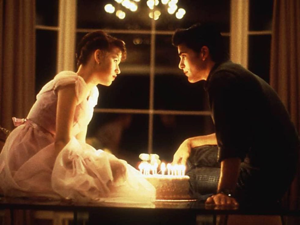 kiss scene from Sixteen Candles between Molly Ringwald and Jake Ryan