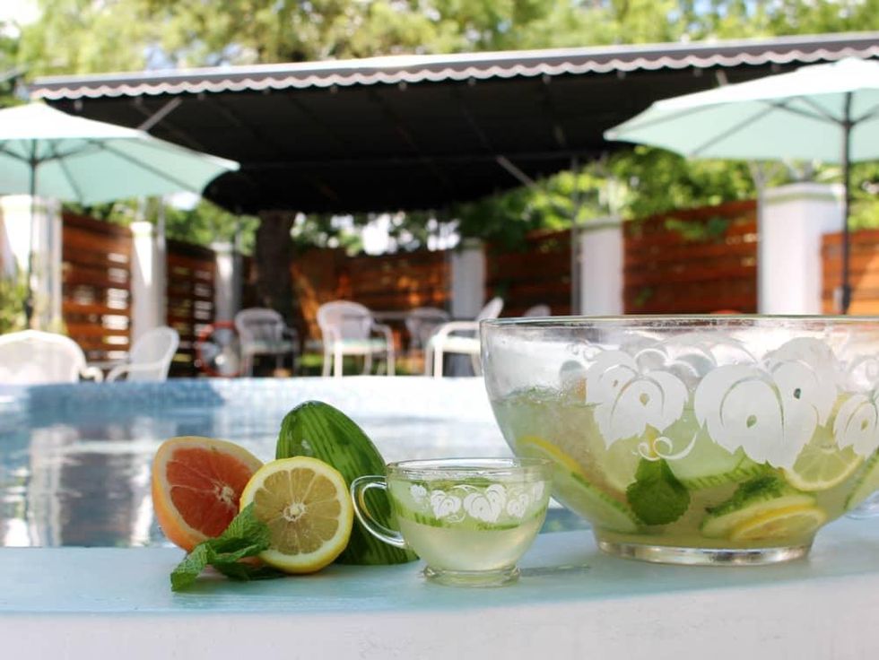 Kitty Cohen's Austin bar cocktails drinks Key Party punch outdoor patio pool
