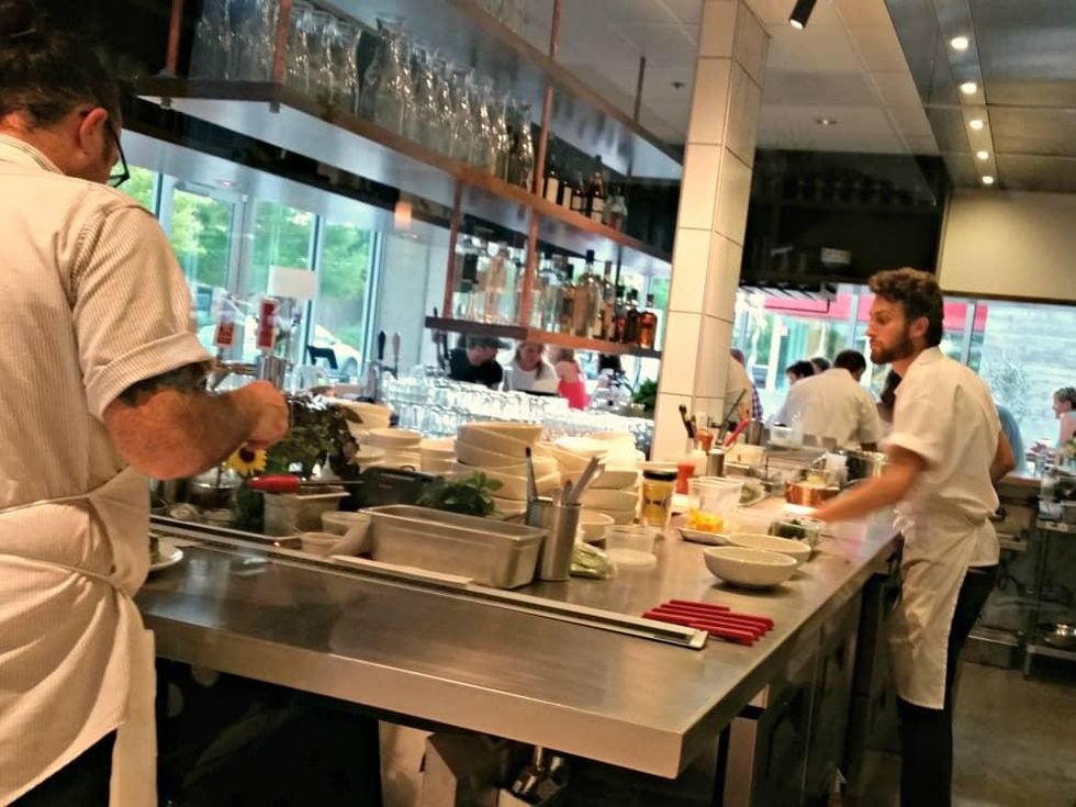 L'Oca D'Oro Austin restaurant Italian interior open kitchen cooks chefs