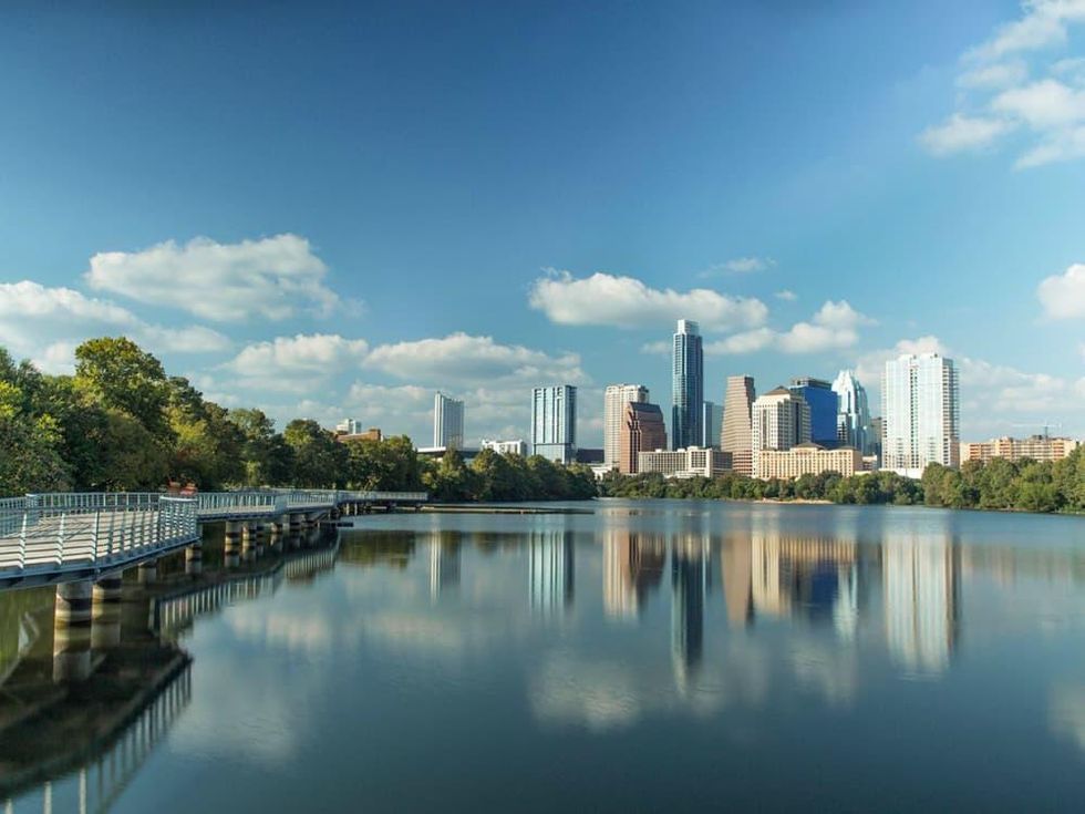 Lady Bird Lake boardwalk and Austin skyline