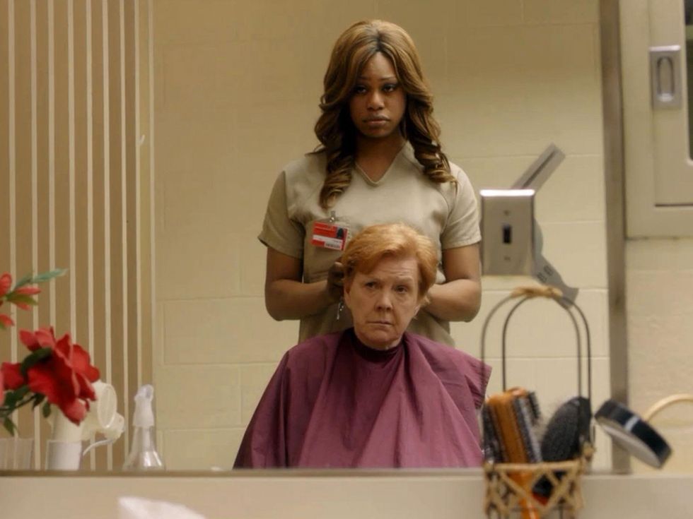 Laverne Cox cutting hair Orange is the New Black