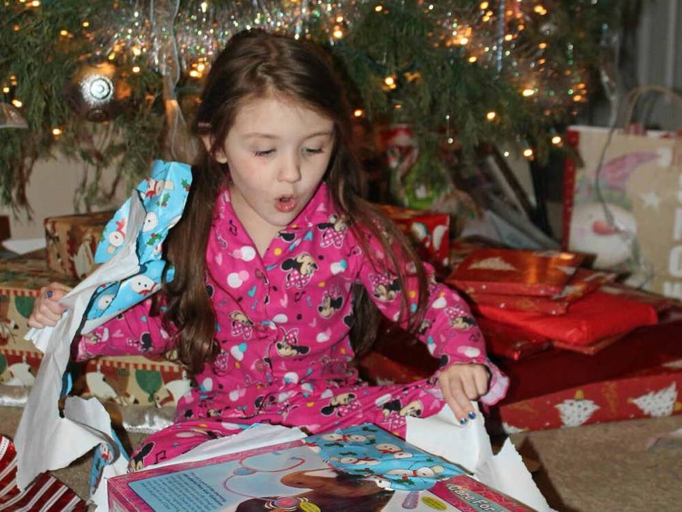 Little girl with presents