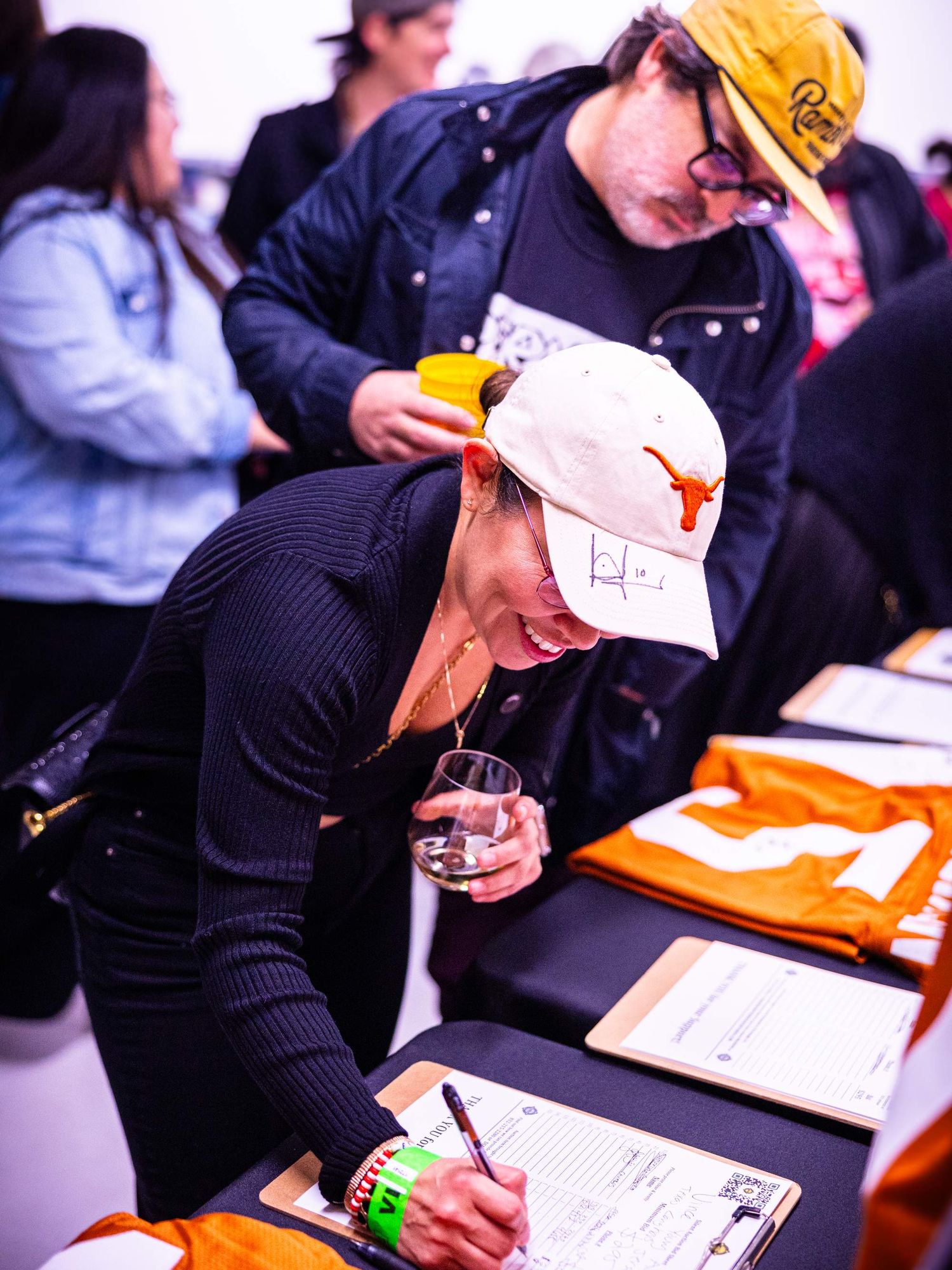 Longhorns fan bidding at Austin Tailgate 2024
