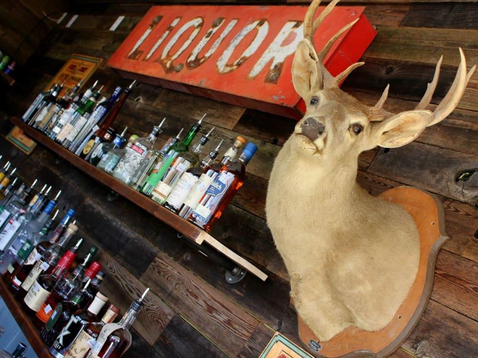 Lustre Pearl Rainey March 2016 patio bar liquor deer