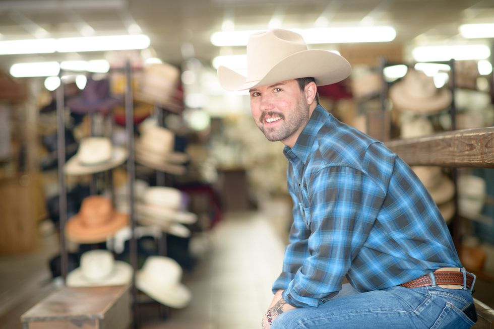 Ma wearing cowboy hat