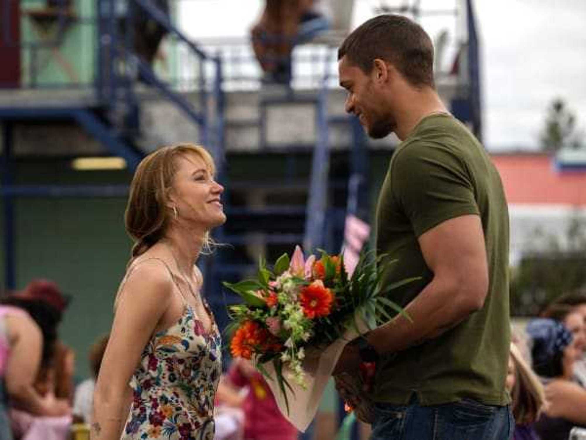 Maika Monroe and Tyriq Withers in Reminders of HIm