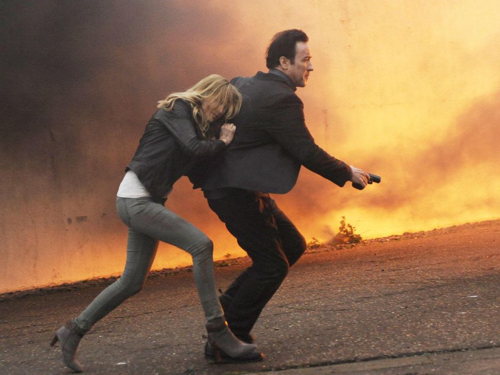 Malin Akermanjohn, John Cusack in The Numbers Station