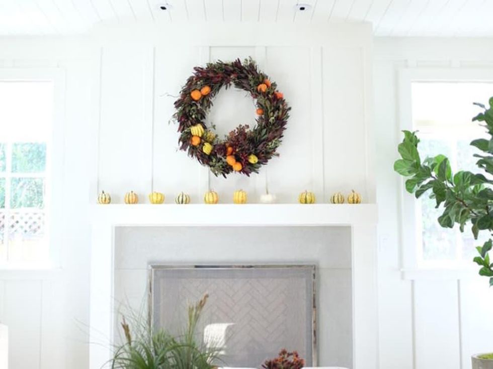 Mantel with holiday wreath