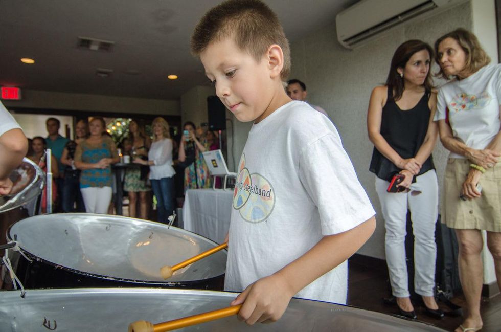 Mixers on the map olive and june Austin Community Steel Band performs at sunset