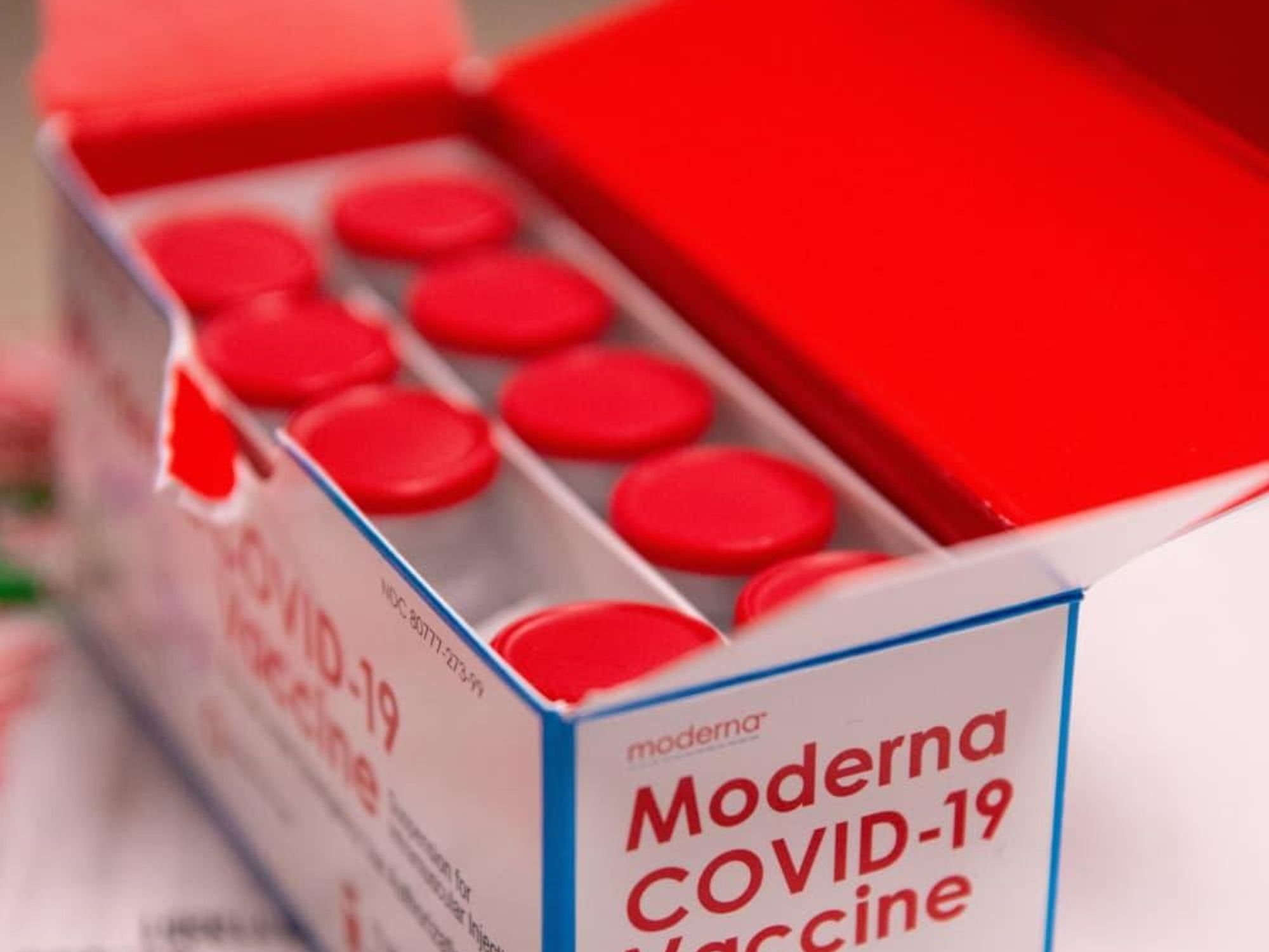 Moderna COVID-19 vaccine box shot doses