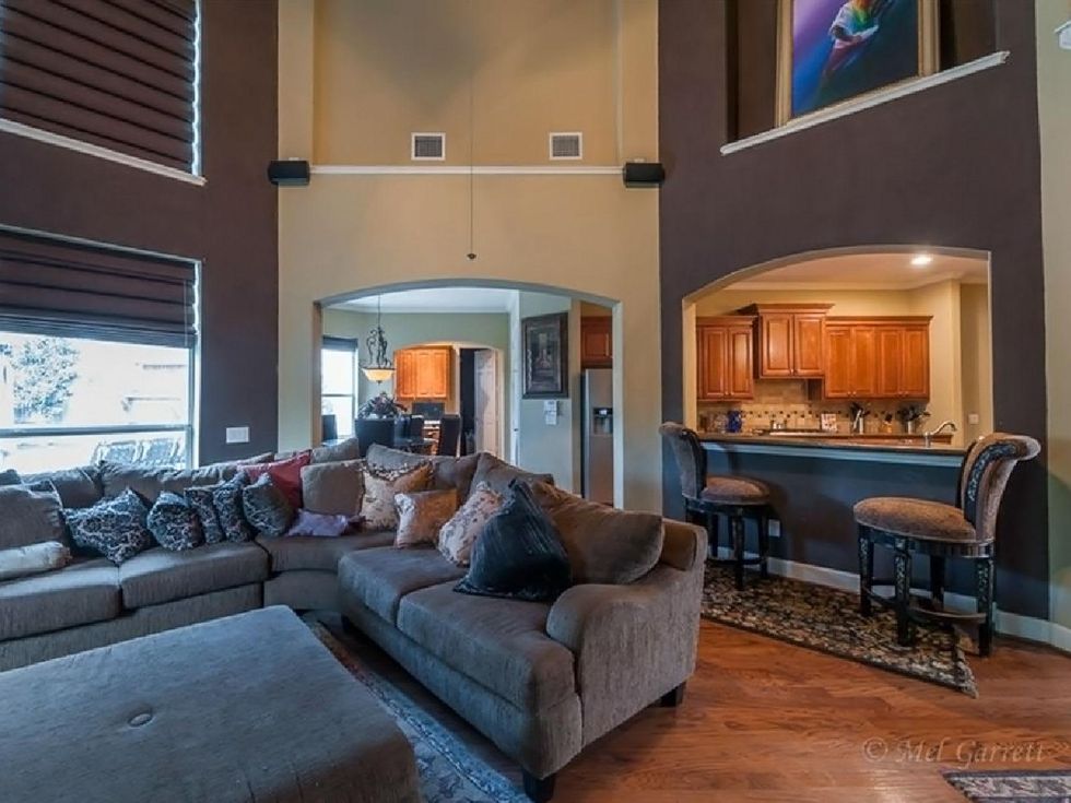 On the Market Vince Young Royal Oaks house 12006 Legend Manor Drive October 2014 family room to kitchen and breakfast nook