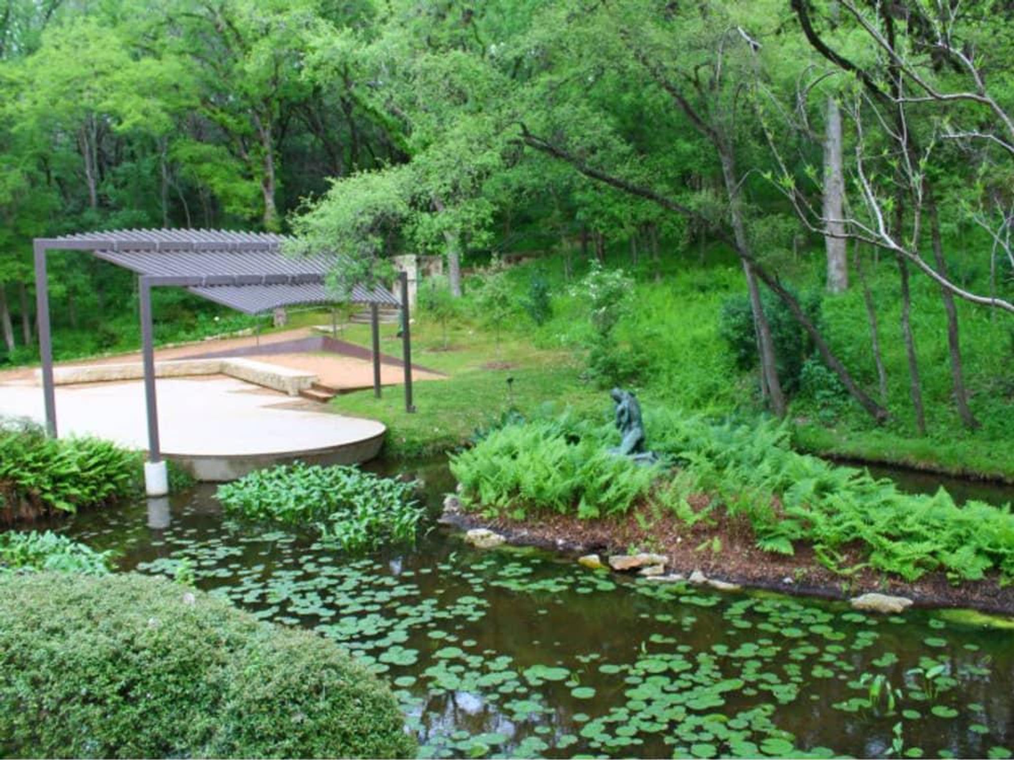outside terrace and pond at the Umlauf Sculpture Garden