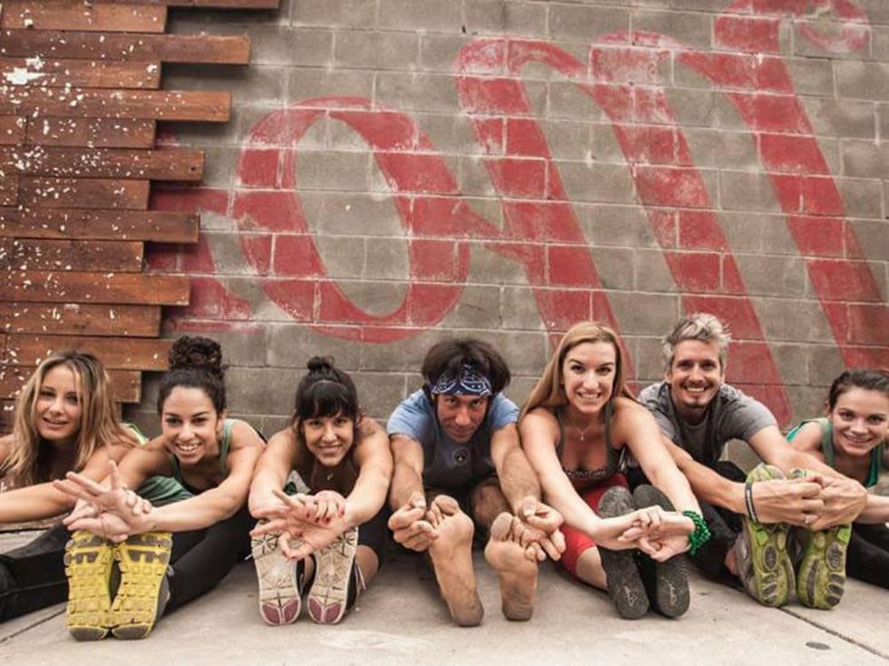 People doing yoga outside of The Mohawk