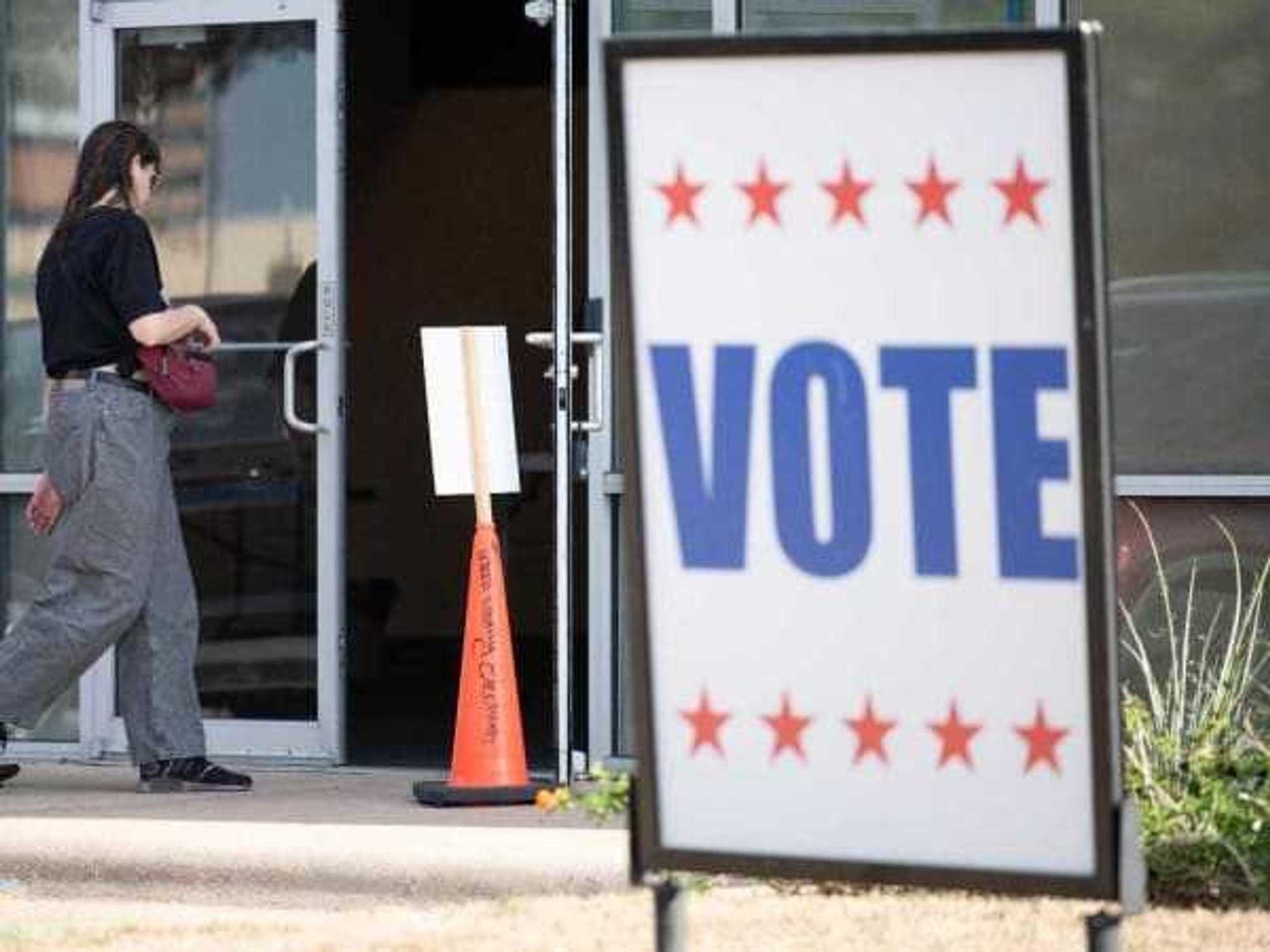 People entering a voting location