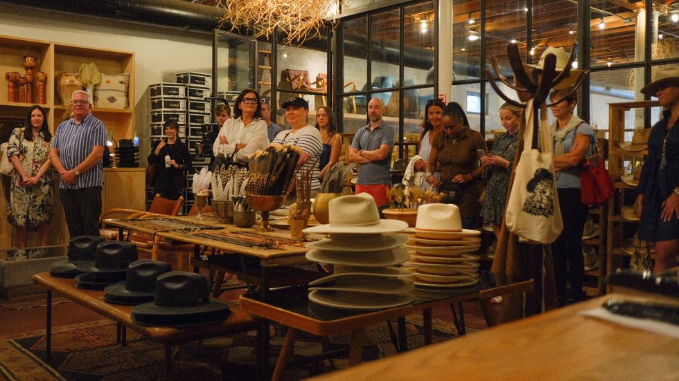 People in cowboy hat shop