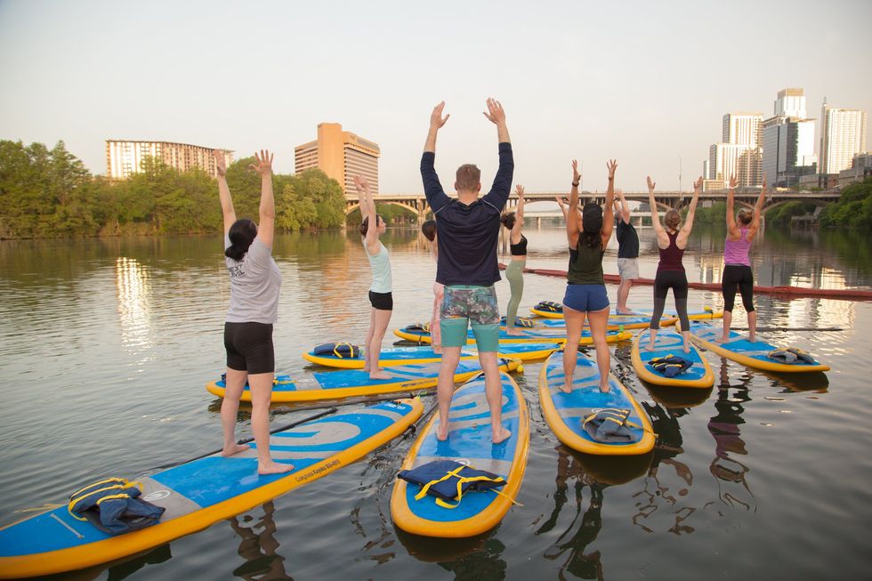 People paddleboarding