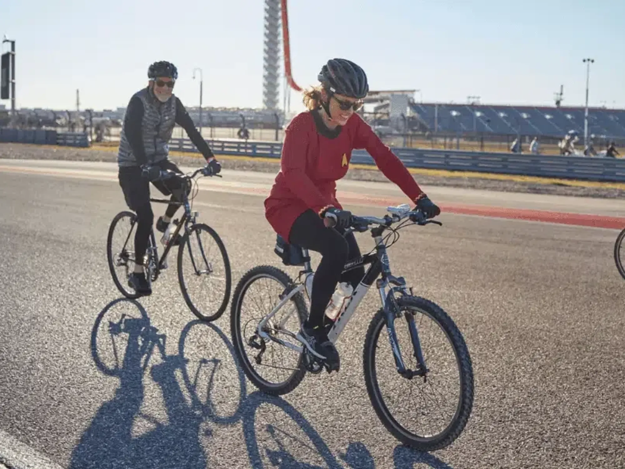 People riding bicycles on track at Circuit of the Americas