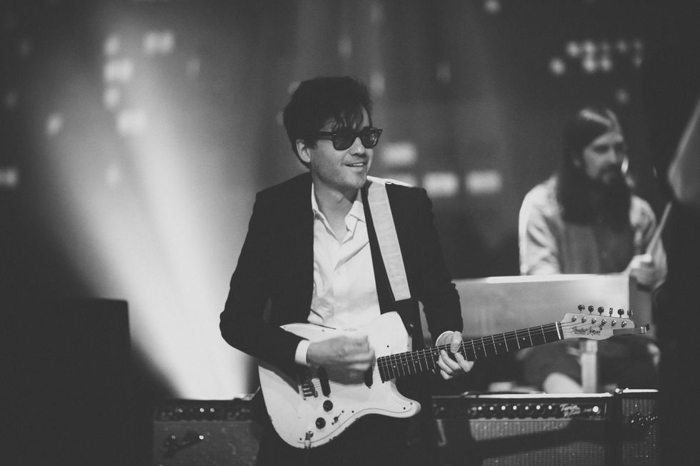Phoenix guitarist in glasses