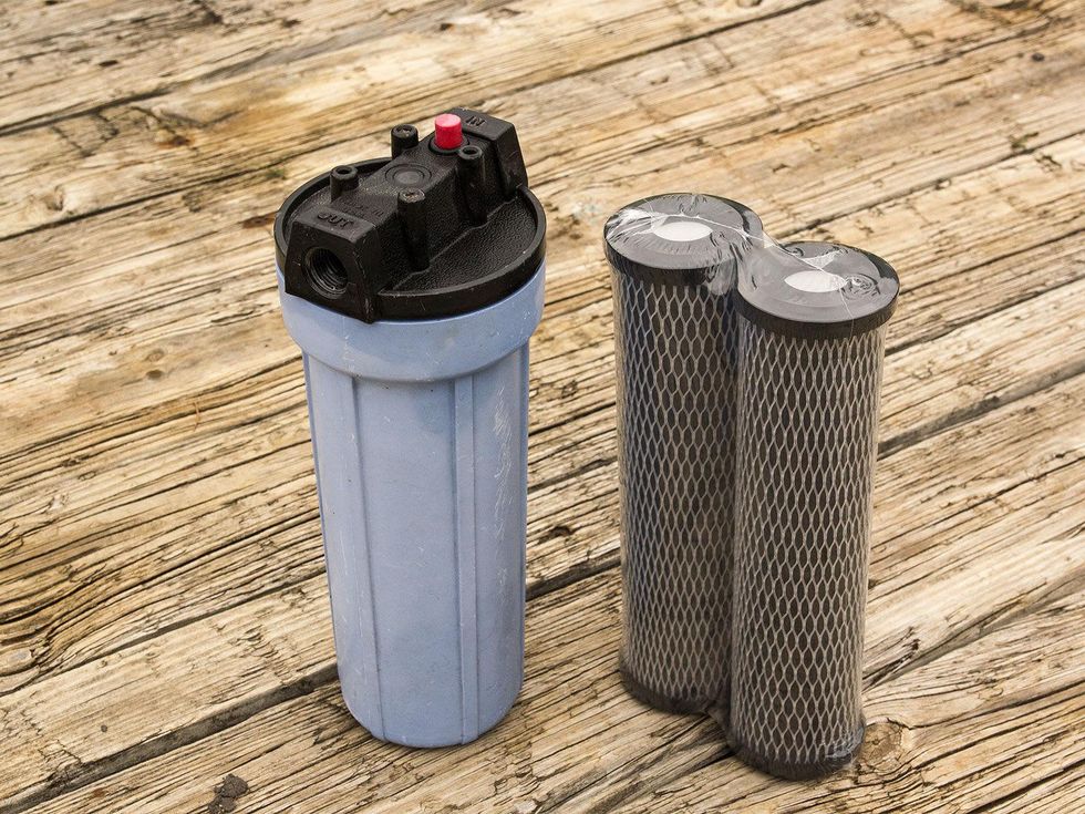 Photo of water filter housing and cartridges